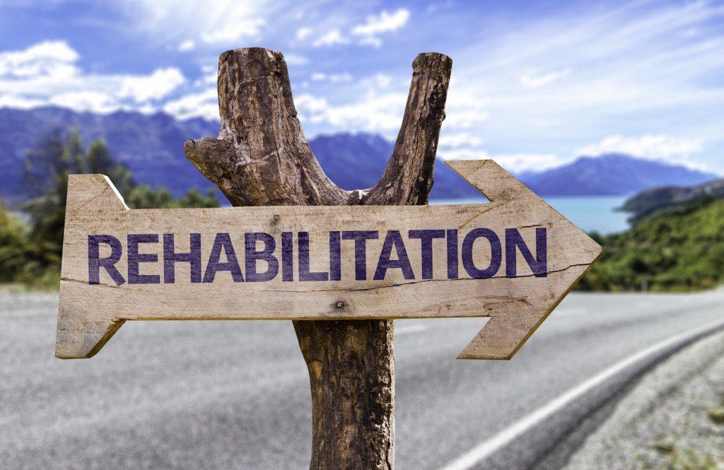 Wood Sign that Says Rehabilitation